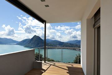 Modern apartment,.balcony overlooking the lake