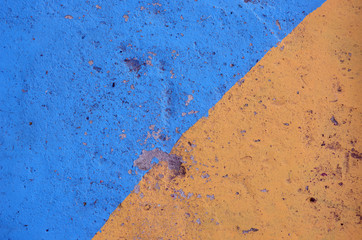 blue and yellow painted  concrete background