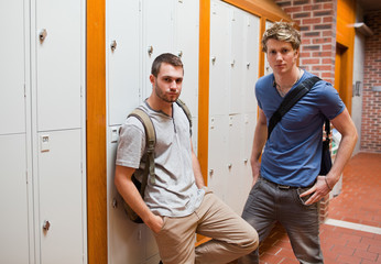 Handsome students standing up