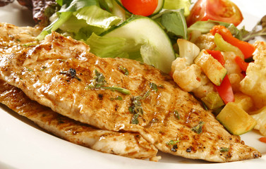 Grilled chicken breast with salad