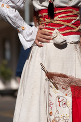 Sardinia, Italy: Redentore festival. Detail of a dress