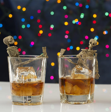 Skeleton with a Whisky. Alcoholism problem