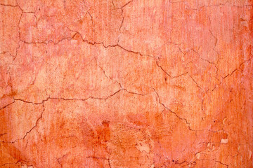 grunge wall cracked texture in orange