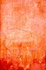 grunge wall cracked texture in orange