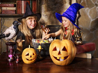 Witch  with pumpkin lantern.