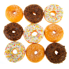 Various donuts on white background