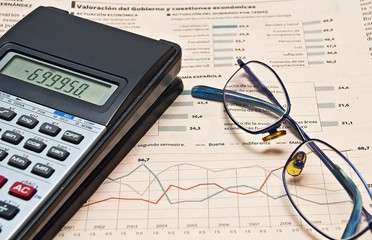 Prensa y calculadora