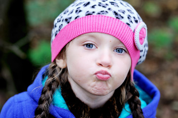 Portrait of funky little child girl wearing beret