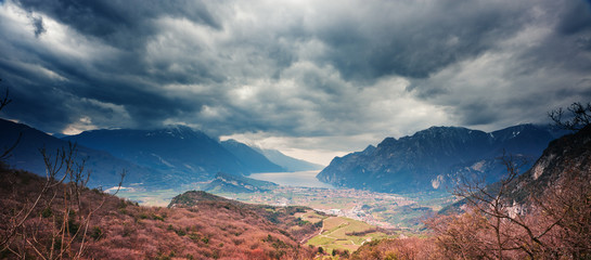 Autumn panorama under moody clouds. Lago di Garda, Italy. - 35677441