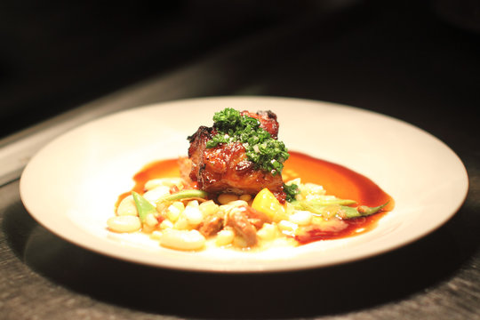 Gourmet pork entree at a restaurant.