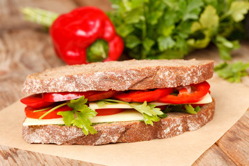 sandwich with cheese and vegetables