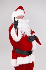 Santa pointing up with finger