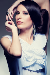 alluring brunette over dark background
