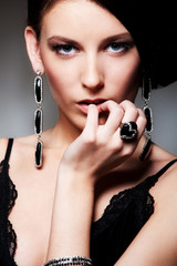 alluring woman over dark background
