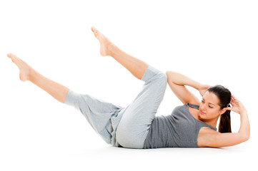 Fototapeta na wymiar woman doing exercises for abdominal muscles