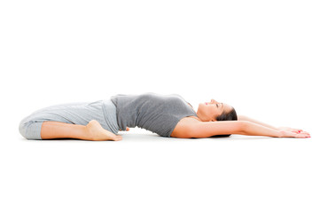woman doing yoga exercise on white floor