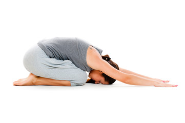 woman doing yoga workouts on floor