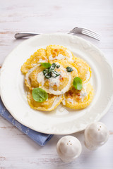 Italian Panzerotti with blue cheese sauce and spinach