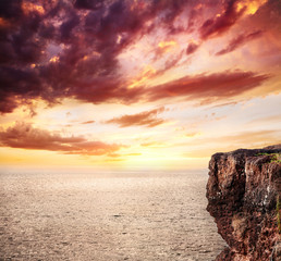 background of ocean, cliff and sunset