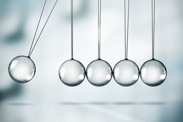 Shiny Newton's cradle illustration