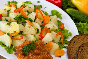 Boiled potatoes with vegetables