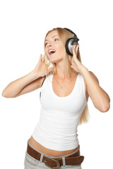 Naklejka premium Beautiful dancing female in headphones