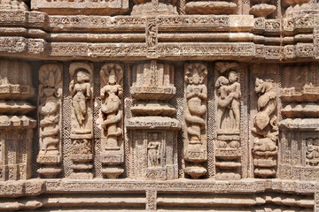 Carved snake hooded women, a mythical beast and a amorous couple