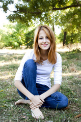 Obraz premium Portrait redhead girl at outdoor.