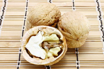 Walnuts close-up on a wooden background