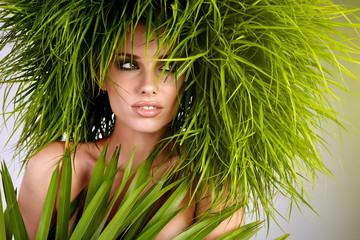Young  woman and abstract green hair