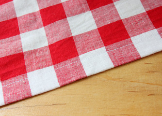 Fototapeta na wymiar red white towel on wooden table