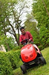 man with lawn mower