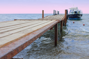 Old pier and boat