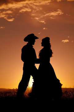 Cowboy couple silhouette in love