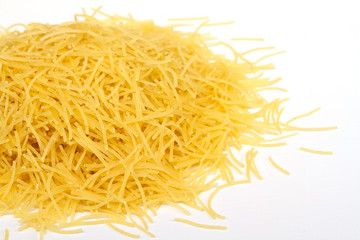 close up of a dried italian pasta on white background