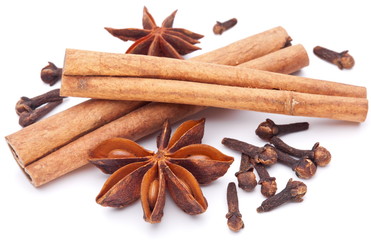 Cloves, anise and cinnamon isolated on white background.