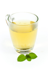 mint tea and leaves on white