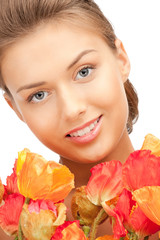 Fototapeta premium lovely woman with red flowers