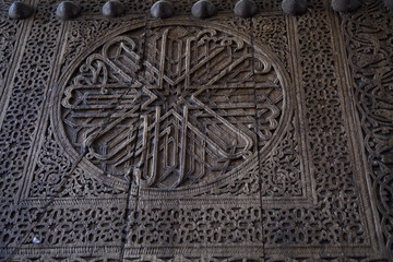 Uzbekistan, an ancient wooden door decorated