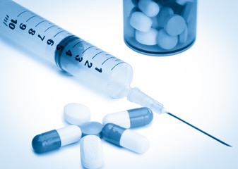 Pills with medicine box and serynge