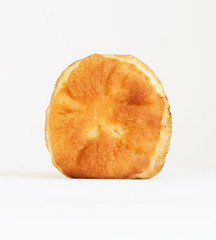 One oven baked pasty over white background. Looks delicious.