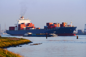 Big container ship on the river