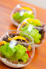 Fresh healthy salad in bowls