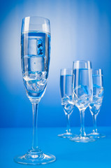 Water in the glass against gradient background