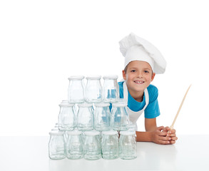 Happy chef with jars for canning