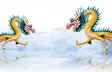 Dragon sculpture flying on sky background
