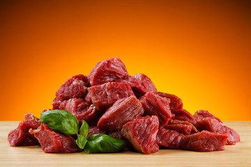 Raw beef on cutting board