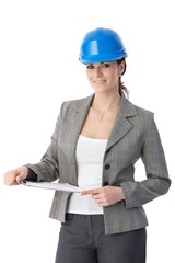 Engineer woman in hardhat