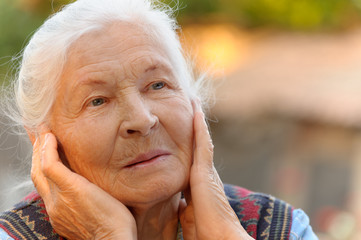 Portrait of the elderly woman