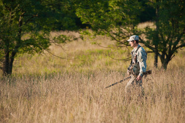 Hunter in countryside